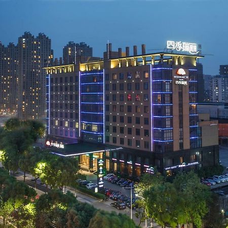 Four Seasons Rayli Hotel Ningbo Bagian luar foto