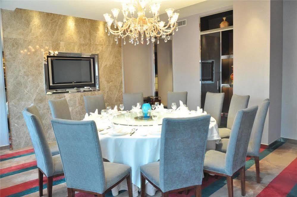 Four Seasons Rayli Hotel Ningbo Bagian luar foto