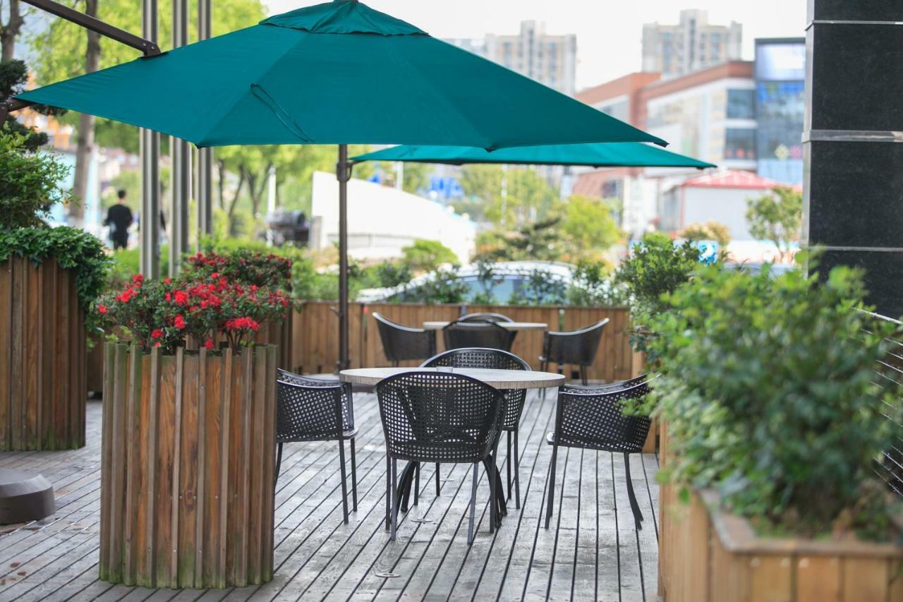 Four Seasons Rayli Hotel Ningbo Bagian luar foto