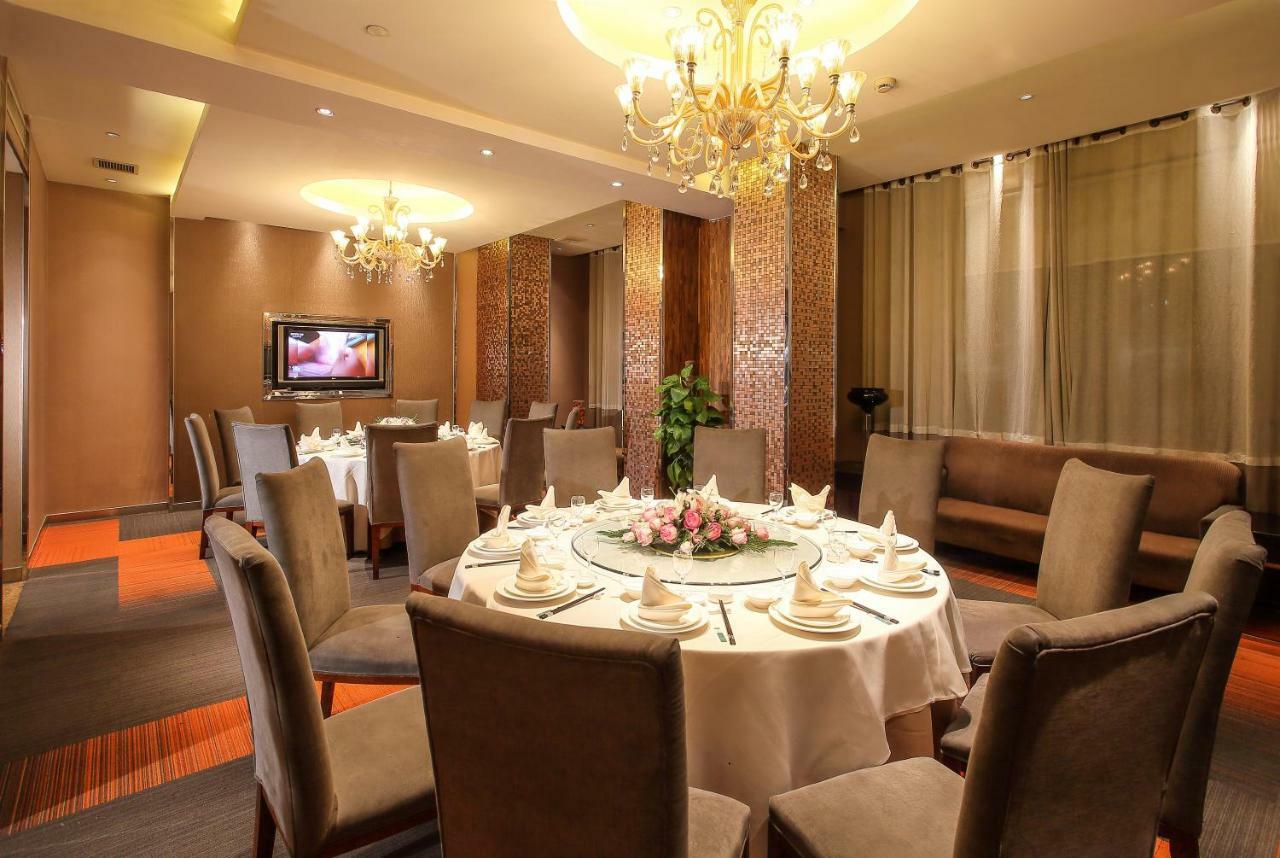 Four Seasons Rayli Hotel Ningbo Bagian luar foto