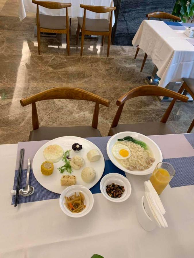 Four Seasons Rayli Hotel Ningbo Bagian luar foto